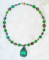 EMERAUDE PENDANT  - One of a kind.  Rare vintage beads. 18" plus 1" pendant